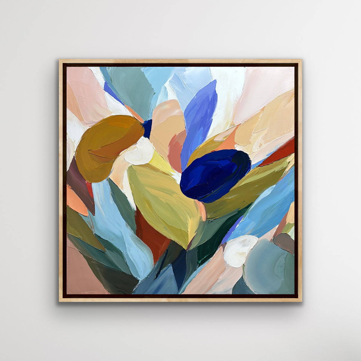 Framed abstract artwork from Connor j Doyle with colorful leaves on a light grey background
