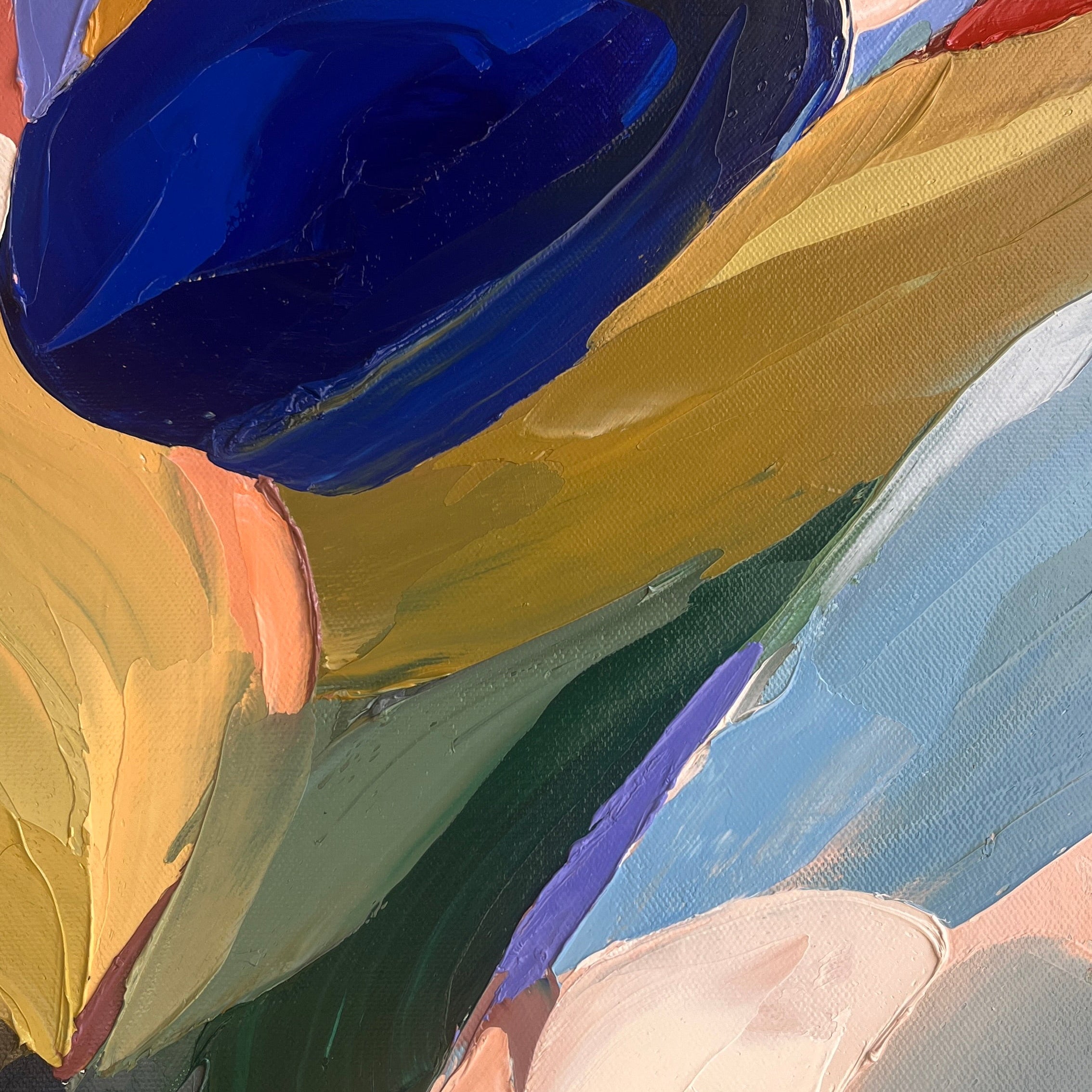 Abstract art with a blue oval shape on a multicolored background