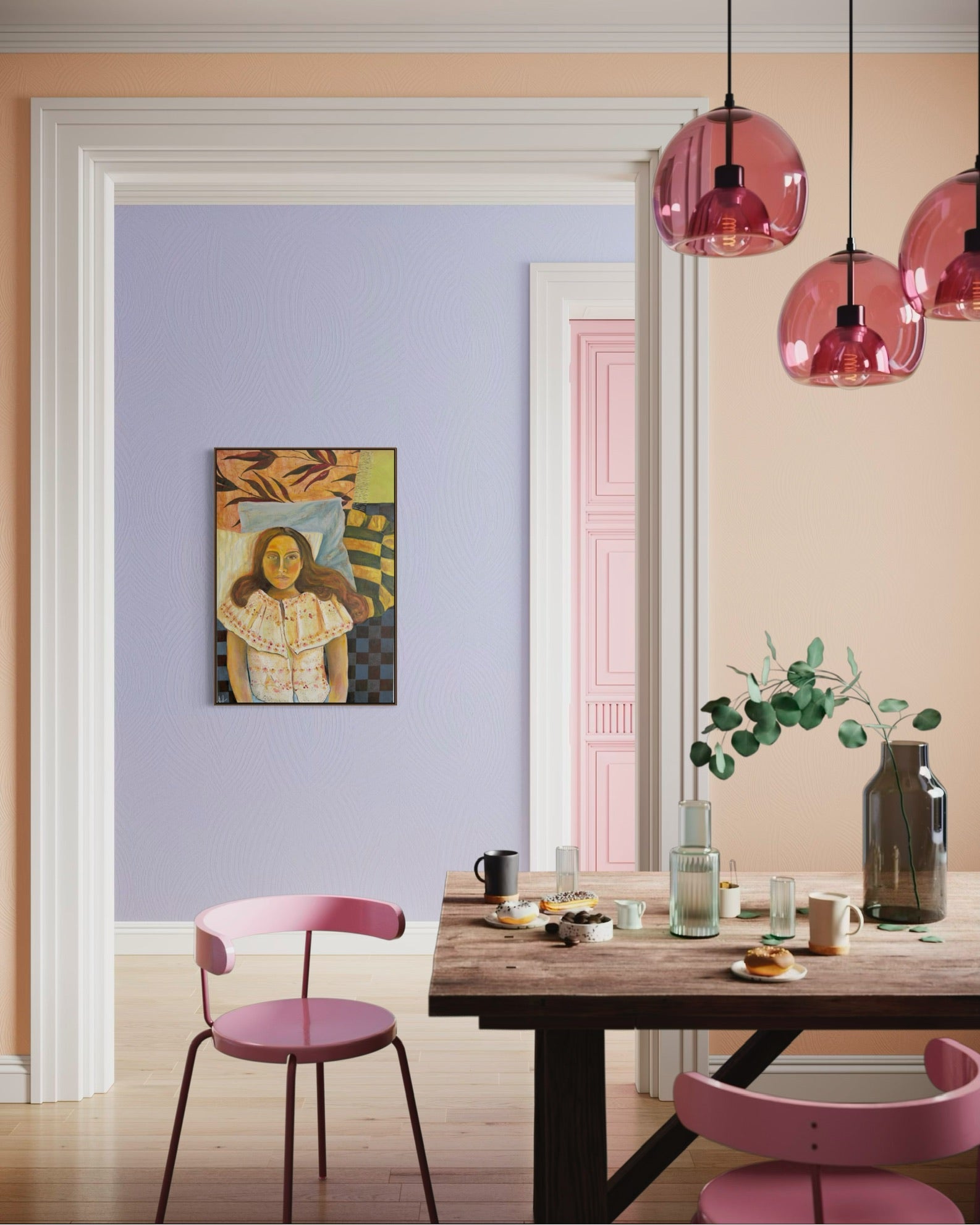 A styled interior dining room scene with a wooden table, pink chairs, pink pendant lights, and a framed portrait painting on a lavender wall, framed by white trim and a pink door in the background.