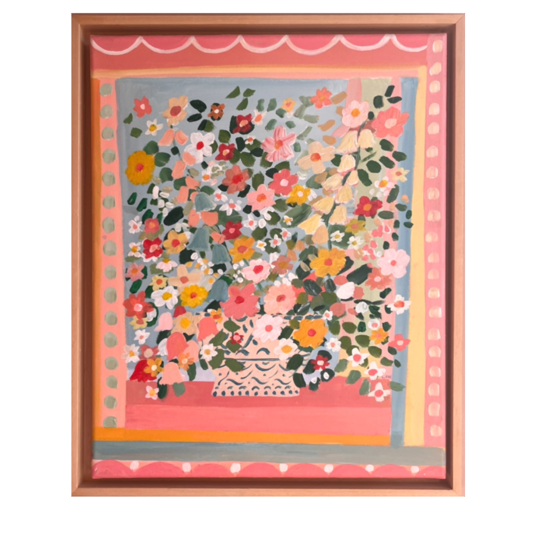 Framed artwork with a colorful floral design on a white background