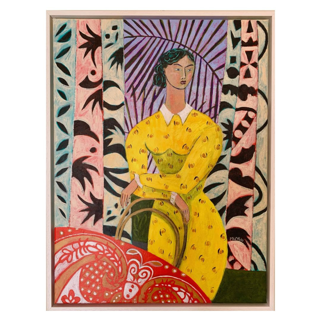 Framed artwork of a woman in a yellow dress with abstract patterns