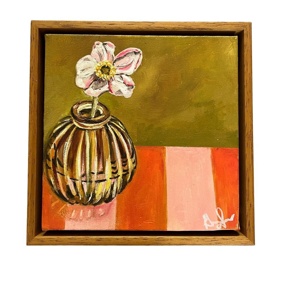 Painting of a flower in a vase on a striped background with a wooden frame.