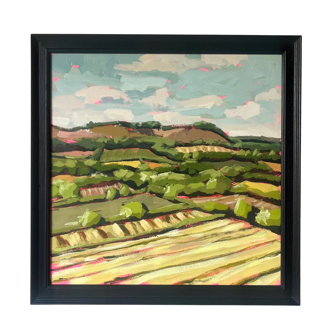 Close up of an art work depicting the countryside 