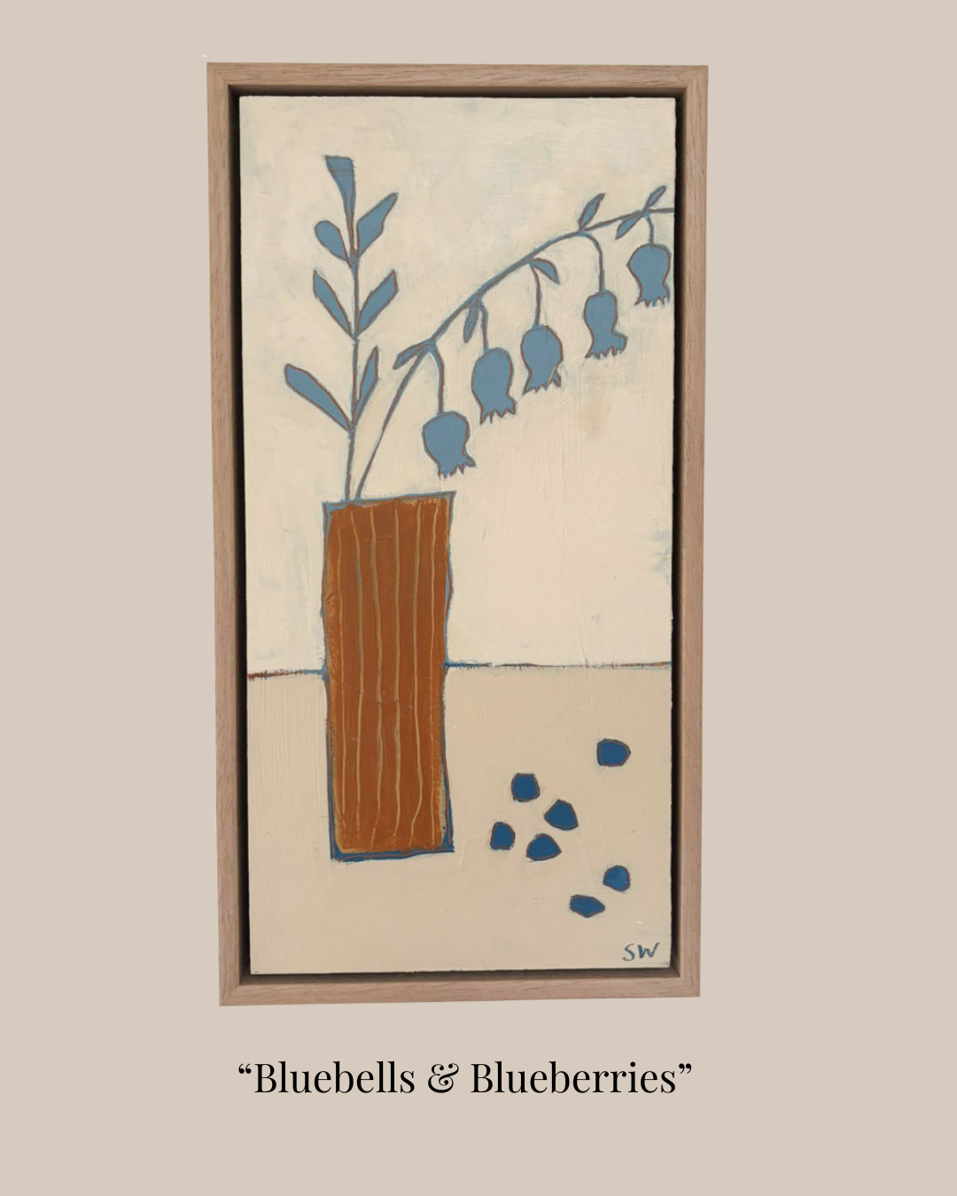 A framed art print titled "Bluebells & Blueberries" featuring a minimalist illustration of bluebells in a brown vase against a cream background, set on a beige backdrop with the title text below.