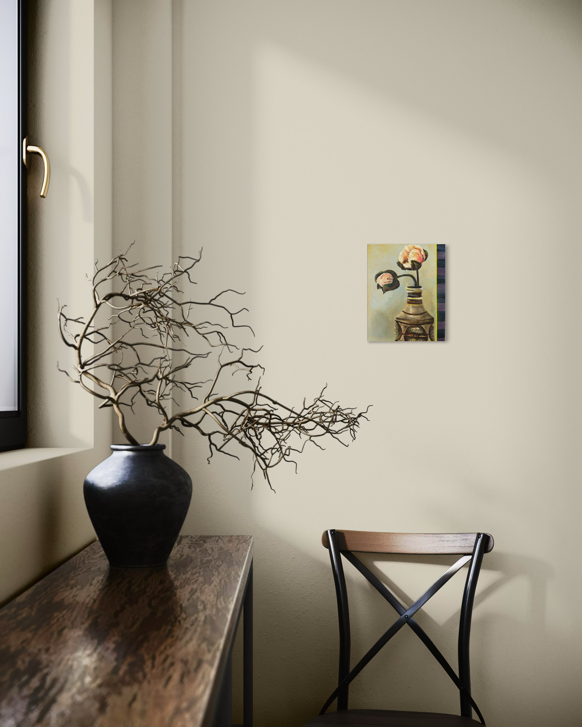 A small square wall art print hangs on a beige wall in a styled interior. The print depicts stacked books with a gramophone on top.