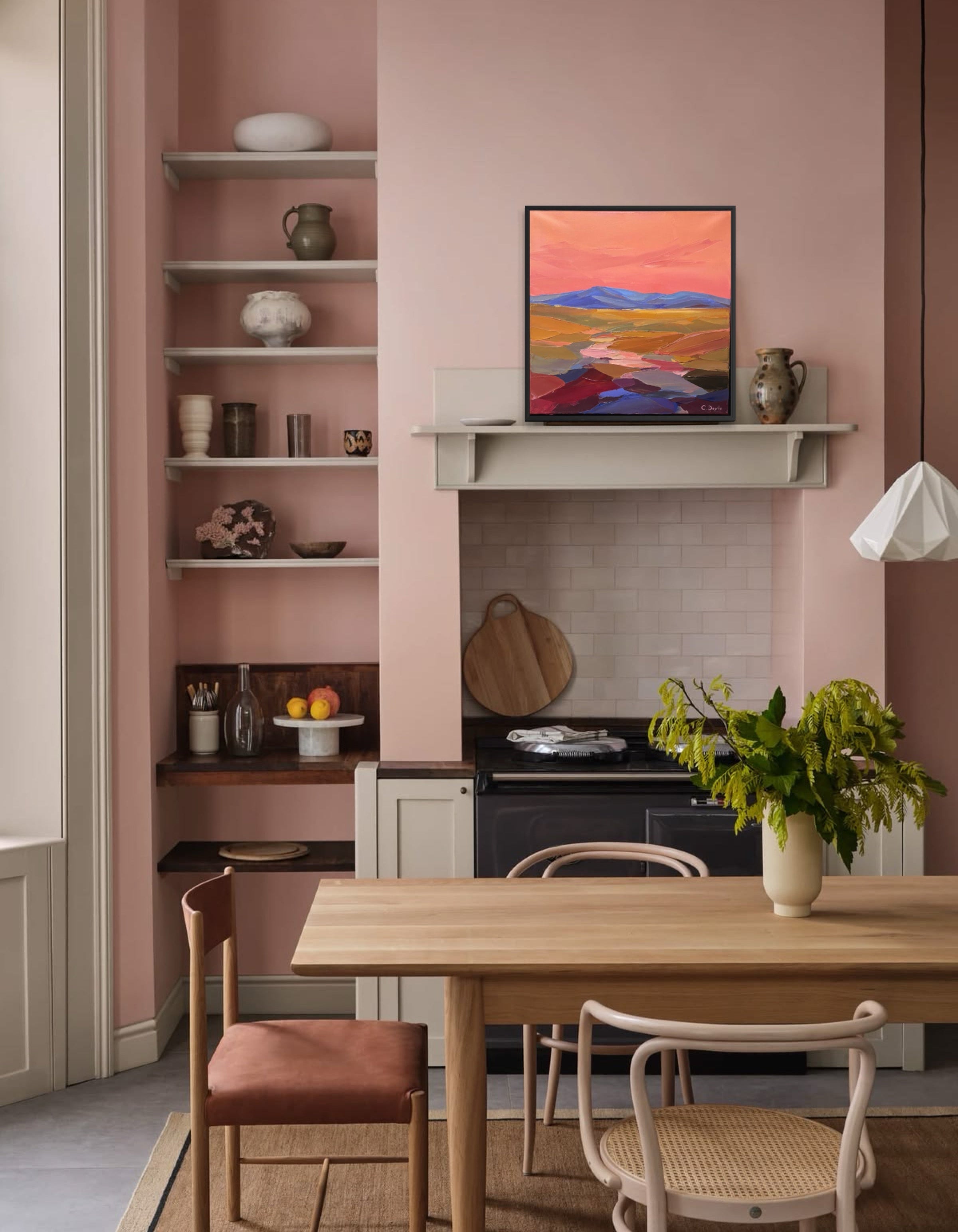 Dining room with a wooden table and chairs, shelves, and a TV on the wall.