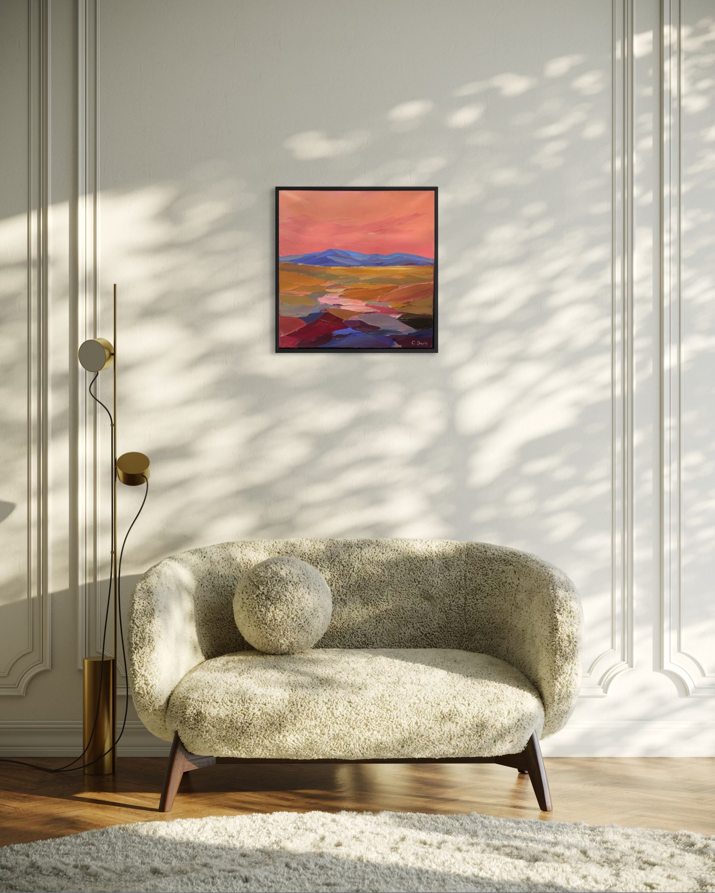 Modern living room with a textured sofa, abstract painting, and floor lamp.