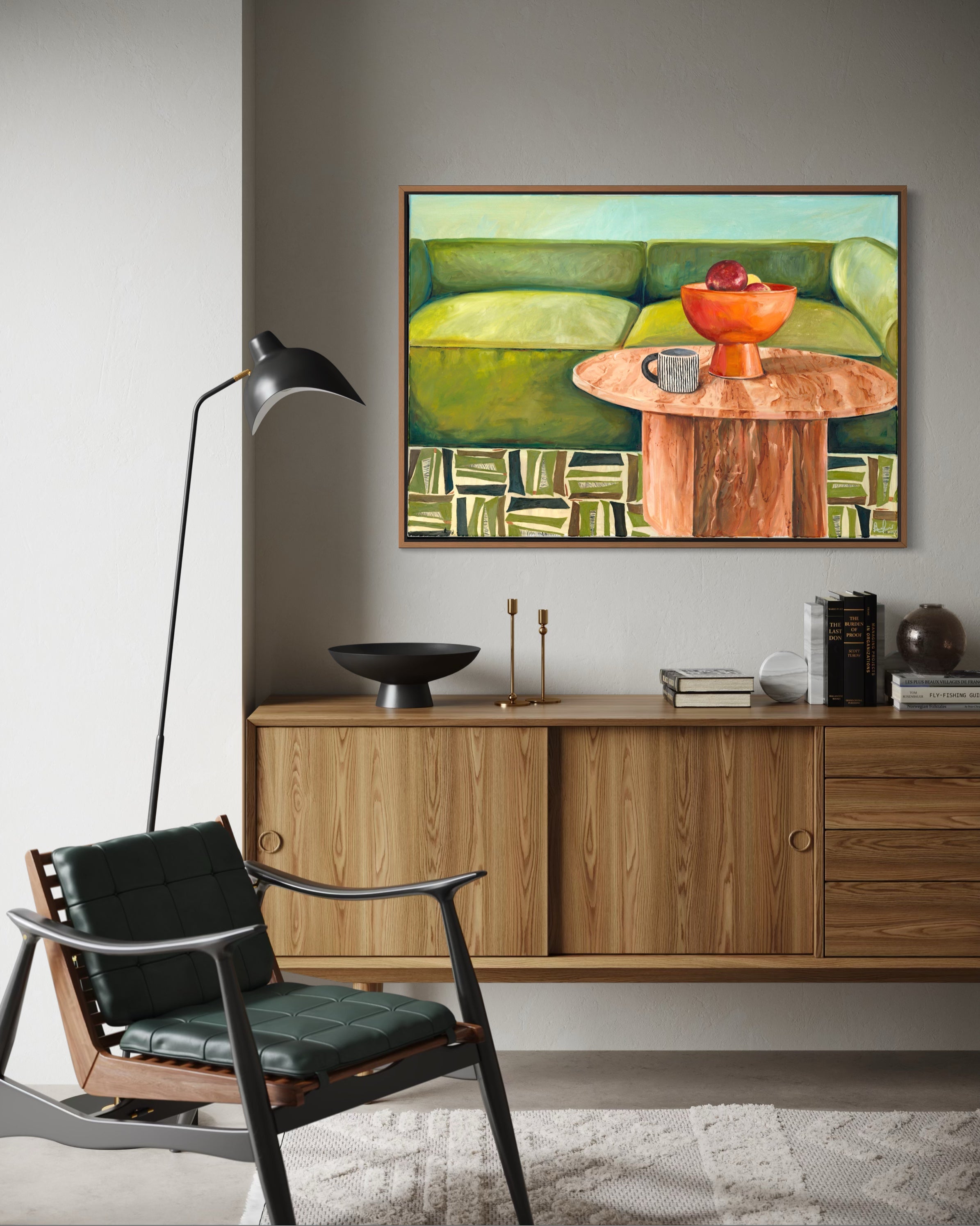 Living room with a wooden cabinet, black chair, and abstract painting on the wall.