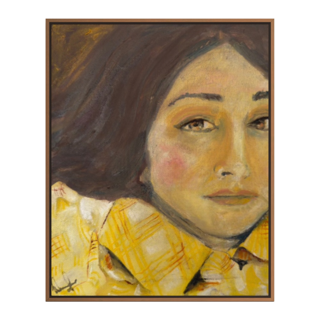 A framed portrait painting of a woman with dark hair and a yellow patterned top, shown against a plain white background.