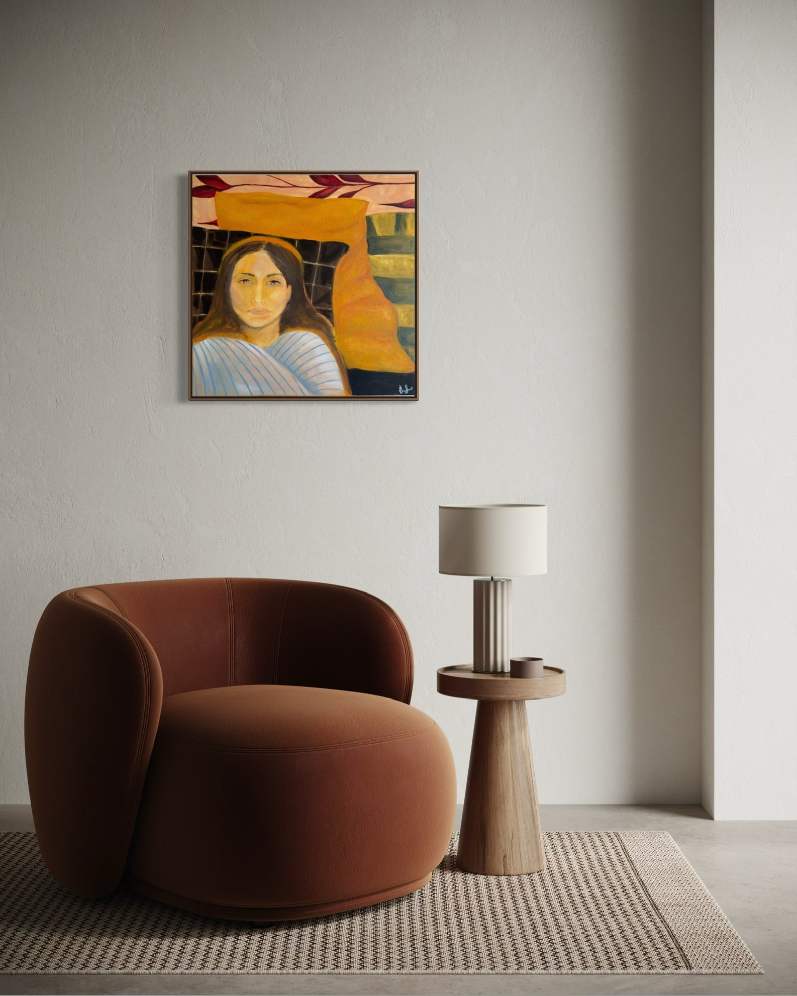 A framed art print depicting a stylized portrait of Mona Lisa with a yellow hat, hanging on a light gray wall above a modern terracotta armchair and a small wooden side table with a lamp.