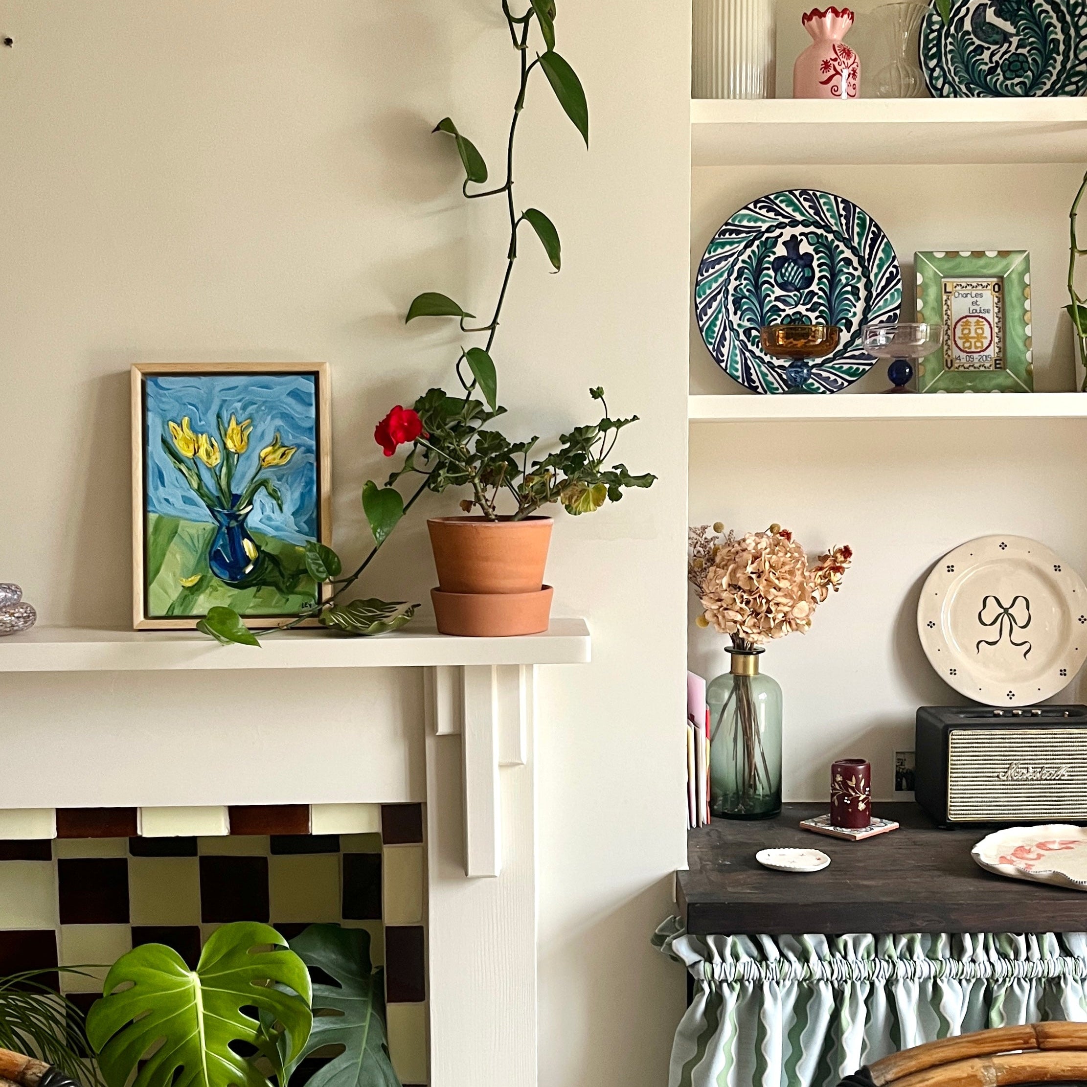 Nest living room with shelves, plants, and decor