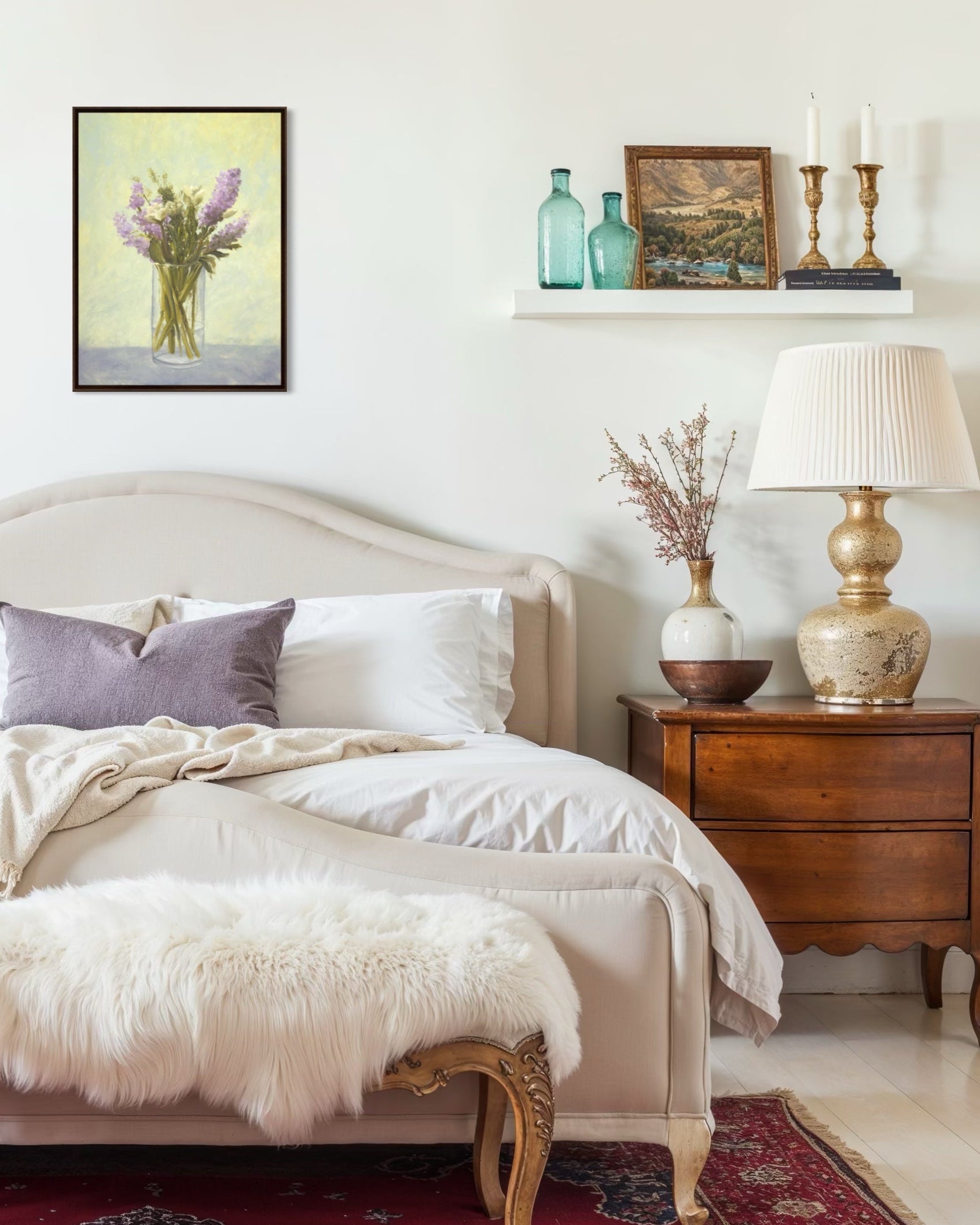 Cozy bedroom with a bed, nightstand, and wall art