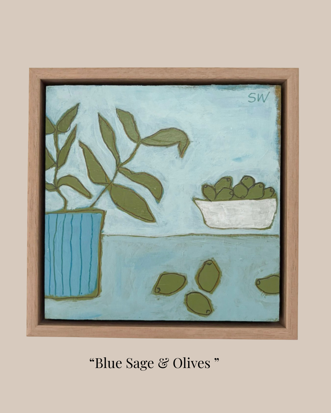 A framed square art print titled "Blue Sage & Olives" showing a stylized still life with green leaves in a blue pot and green olives in a white bowl on a light blue background, set against a beige backdrop with the title text below.