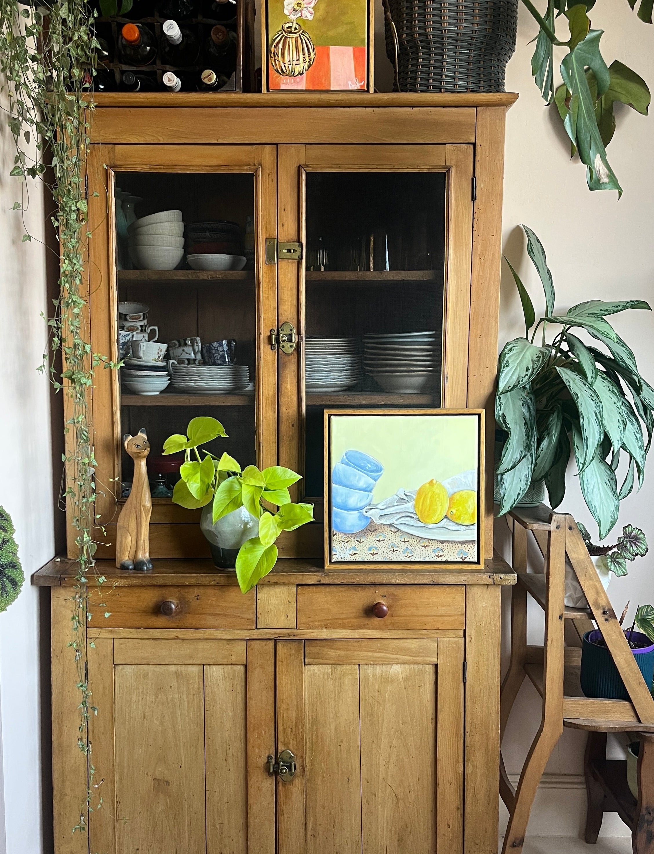 Lemon art works on a wooden dresser