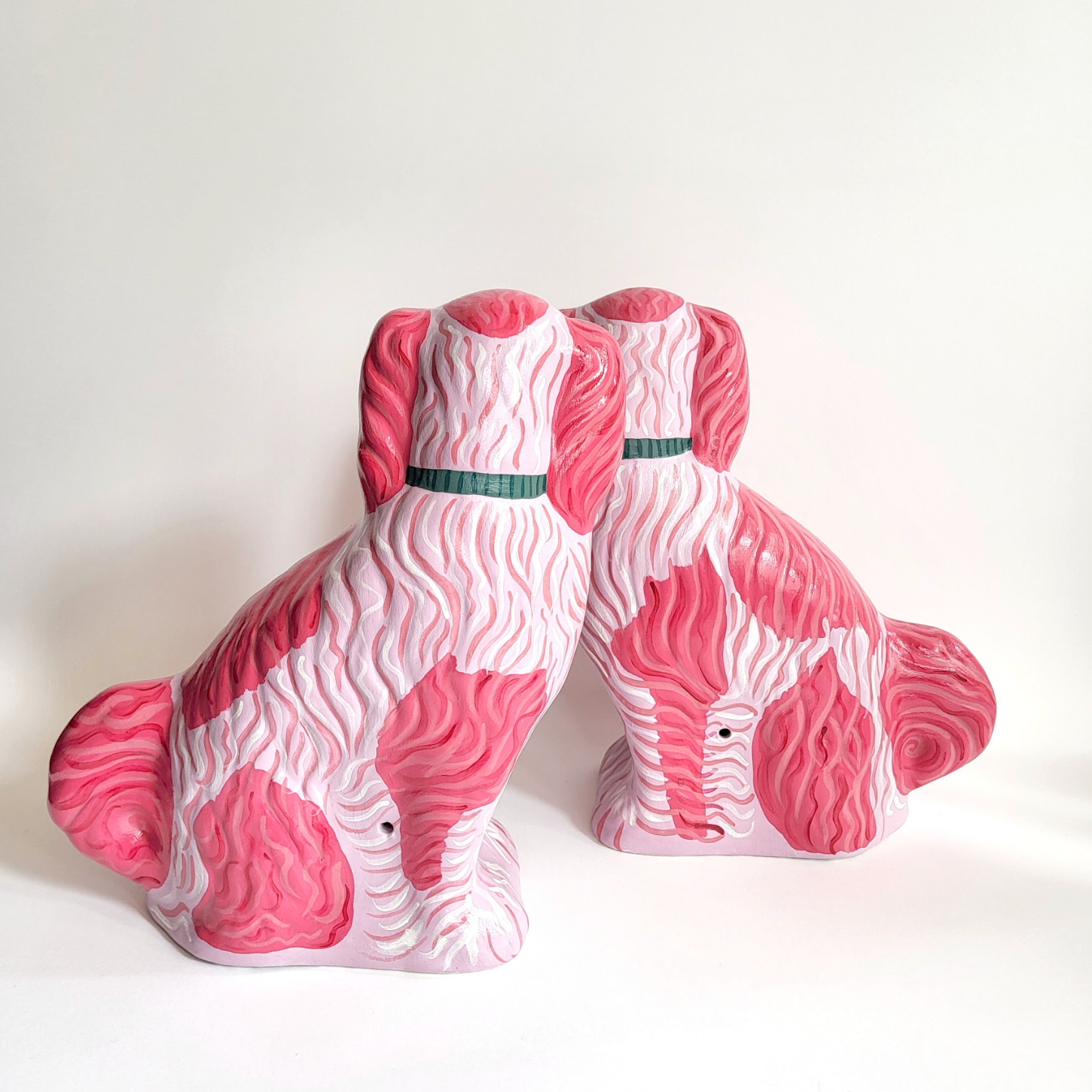 Pair of Pink Hand-Painted Dogs