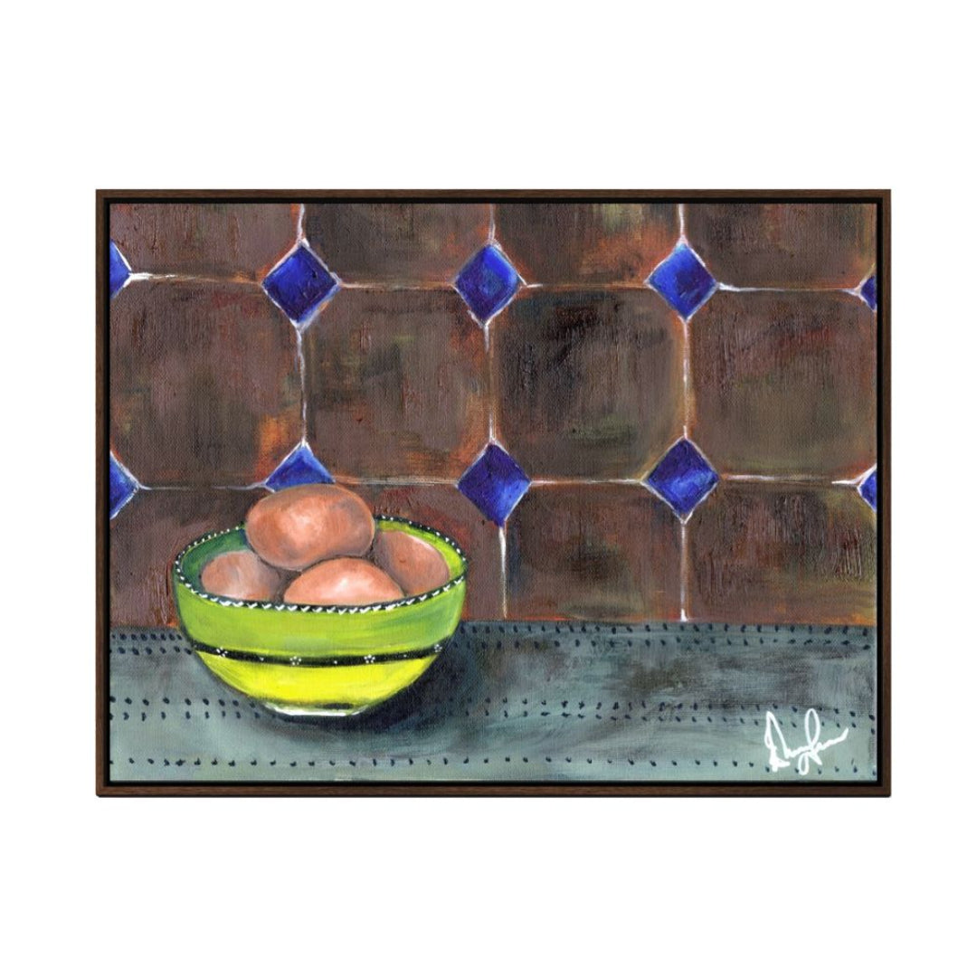 Bowl with eggs on a textured surface with decorative tiles
