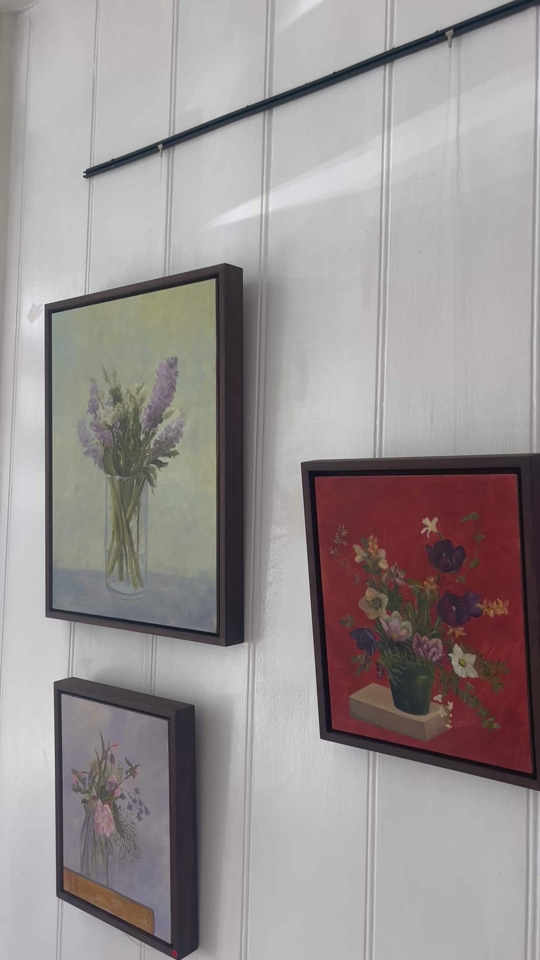 Wall of botanial still life paintings